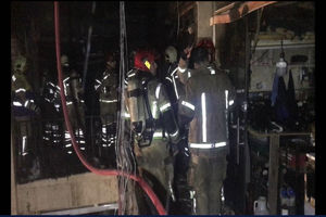 یک پاساژ تولید کفش در بازار طعمه حریق شد