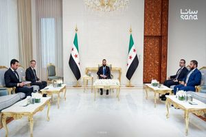 رئیس دولت موقت سوریه و گروسی در دمشق با یکدیگر دیدار کردند