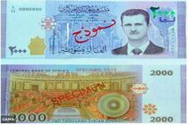 عرضه اسکناس با عکس بشار اسد در سوریه