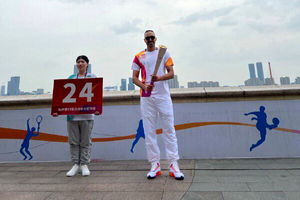 پاکدامن مشعل را حمل کرد/ اهتزار پرچم ایران در دهکده بازی‌های آسیایی هانگژو