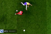 حضور یک زوج ایرانی و ولزی در ورزشگاه احمدبن‌علی + عکس