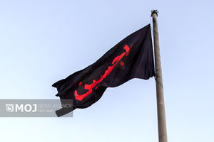 پرچم عزای حسینی بر بلندای پایتخت برافراشته شد + فیلم